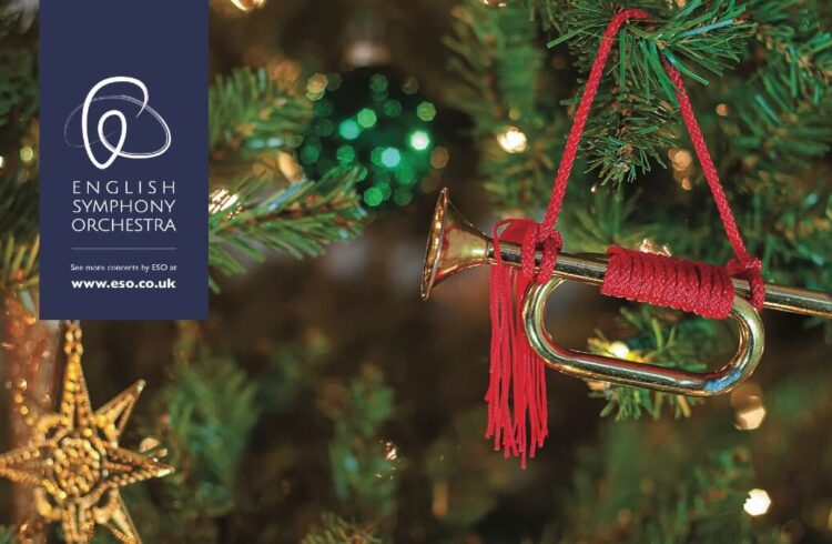 A miniature trumpet hanging from a Christmas tree