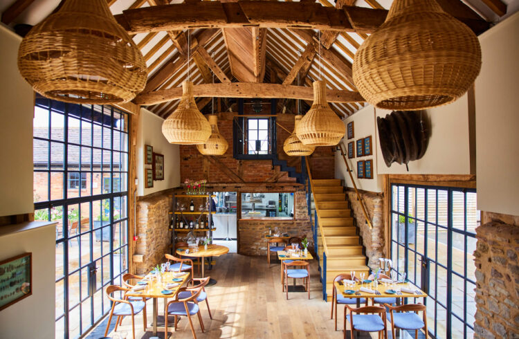 The interior of a restaurant located in a barn conversion