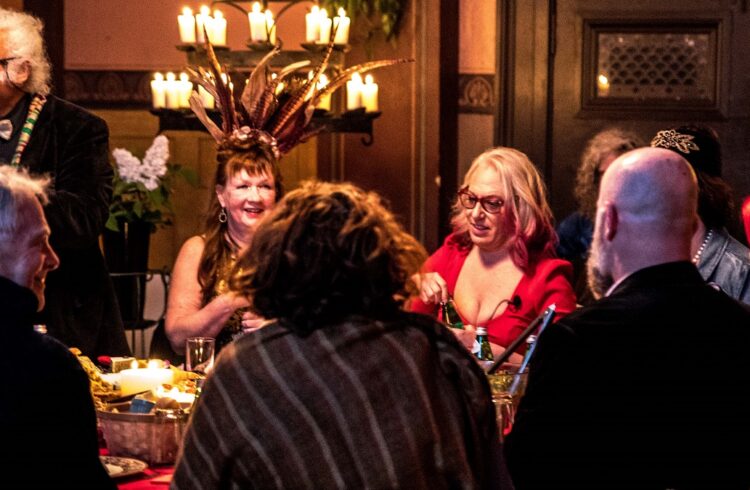 A group of people seated around a dining table