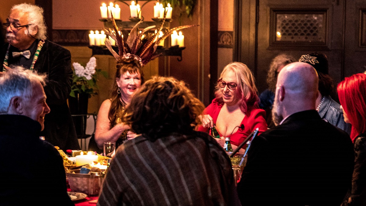 A group of people seated around a dining table