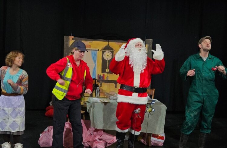 Four actors rehearsing for the play 'A Surprise for Farmer Christmas'